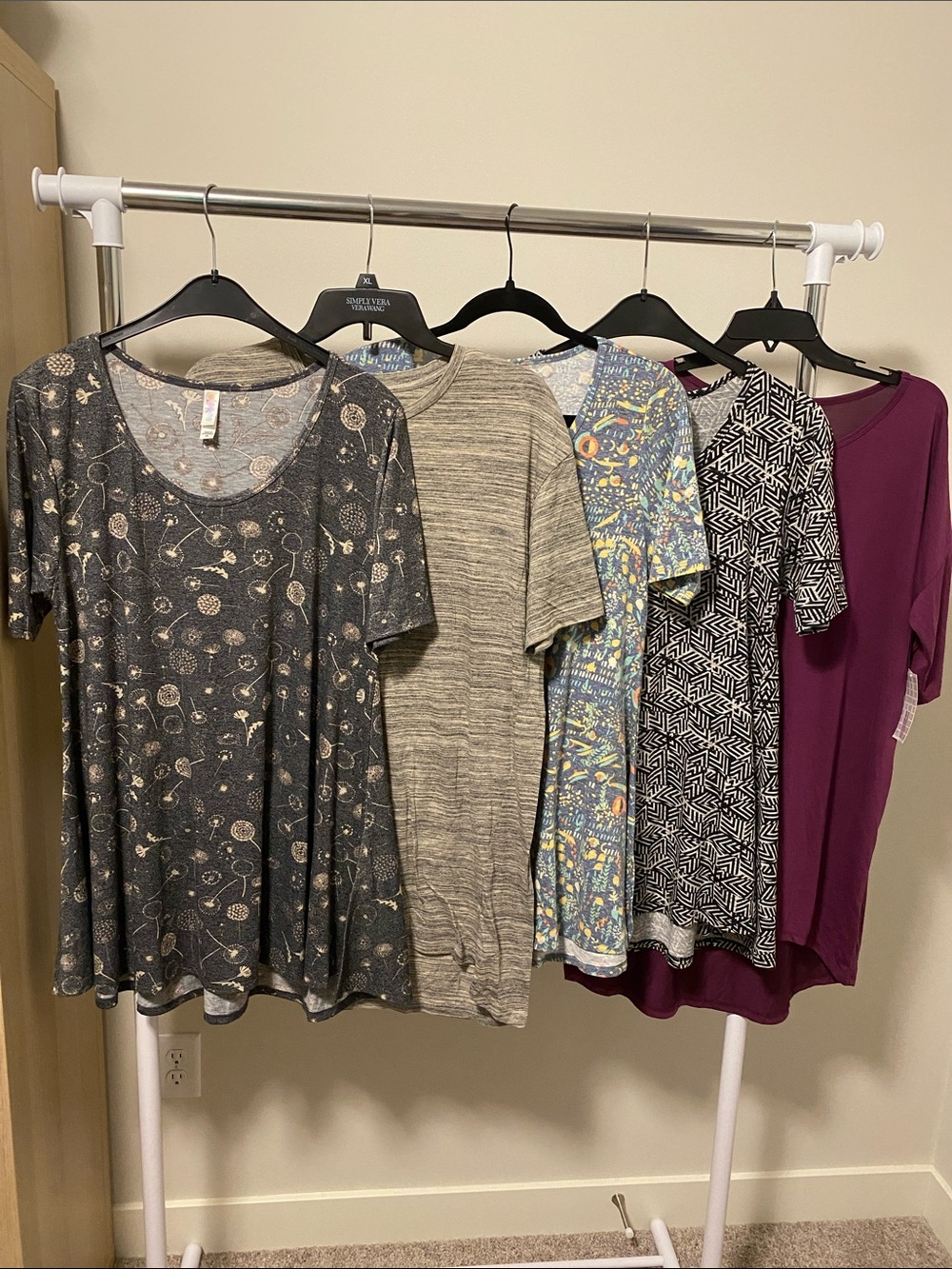 LuLaRoe Short Sleeve Tees bundle in Plum and Multi-Print Assortment
